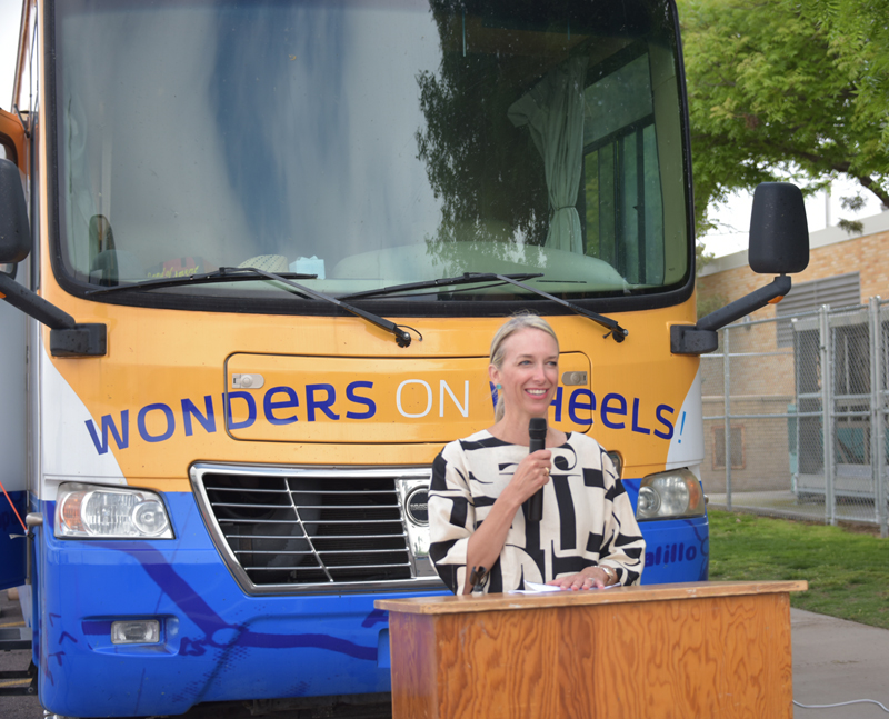 ann maddox in front of wonders on wheels van