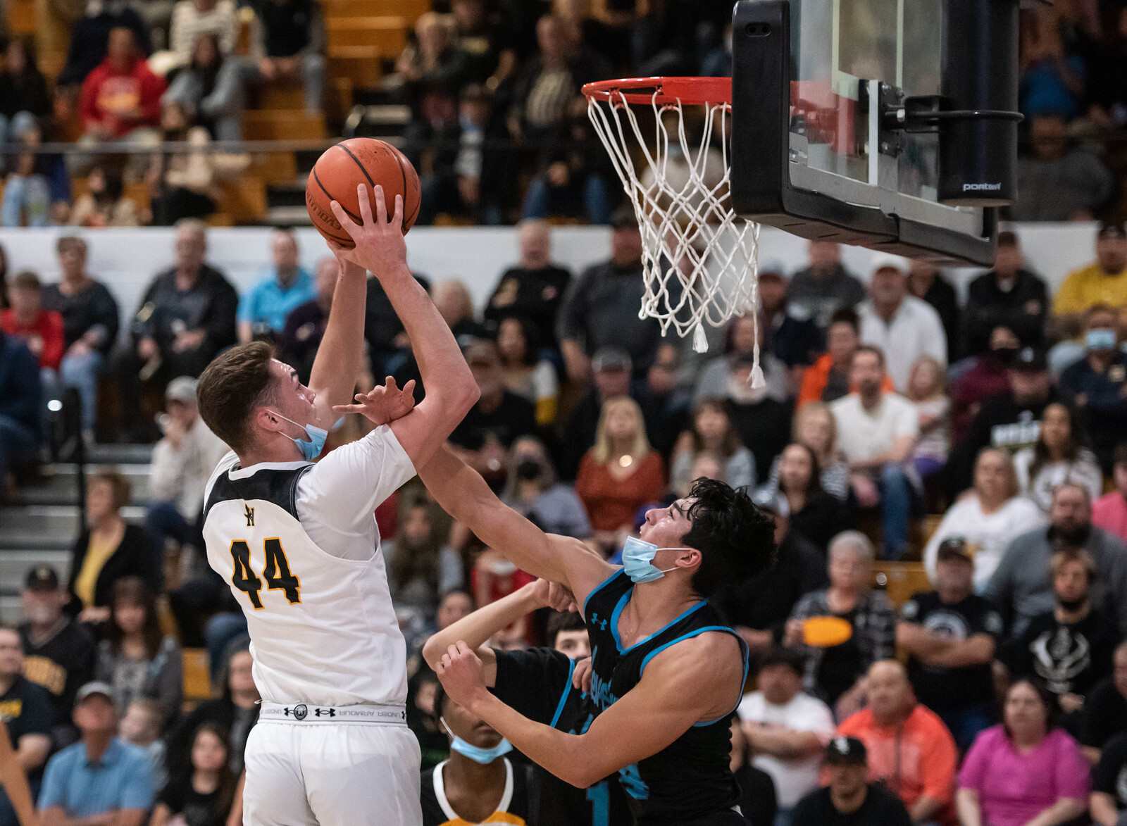 player shooting over defender