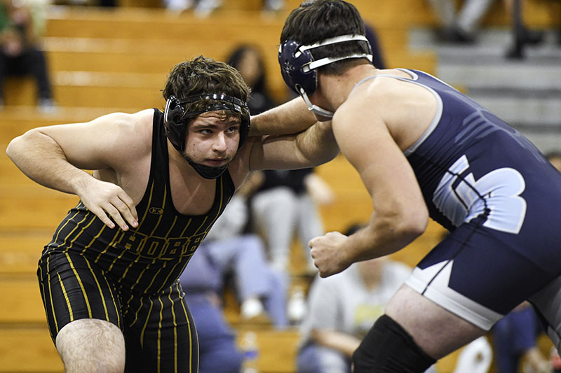 two wrestlers on mat